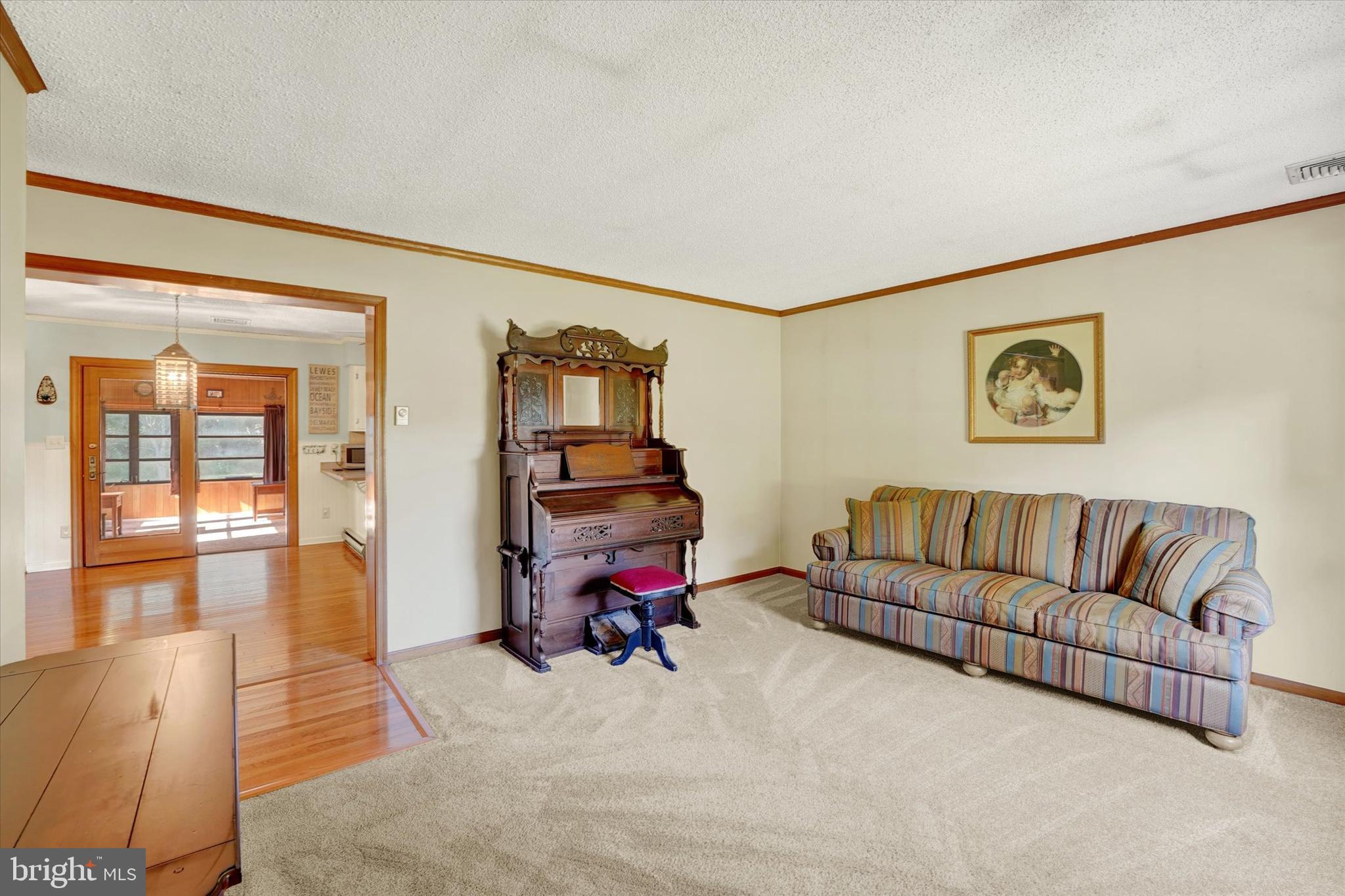 65 Long Point Boulevard Earleville, MD 21919 - Photo 7 of 42 Another View of Living Room & Dining/Kitchen Entry