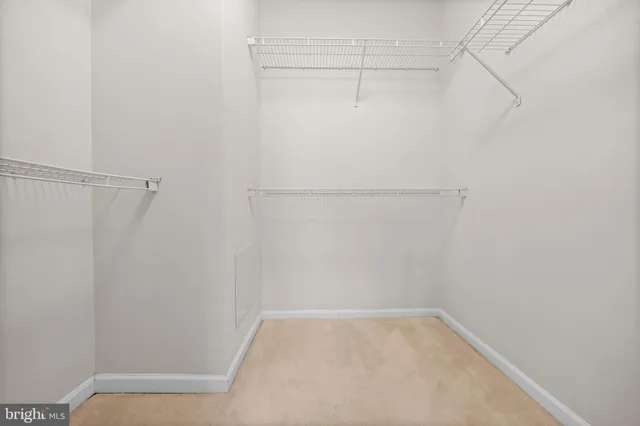 a view of a room with racks on the wall