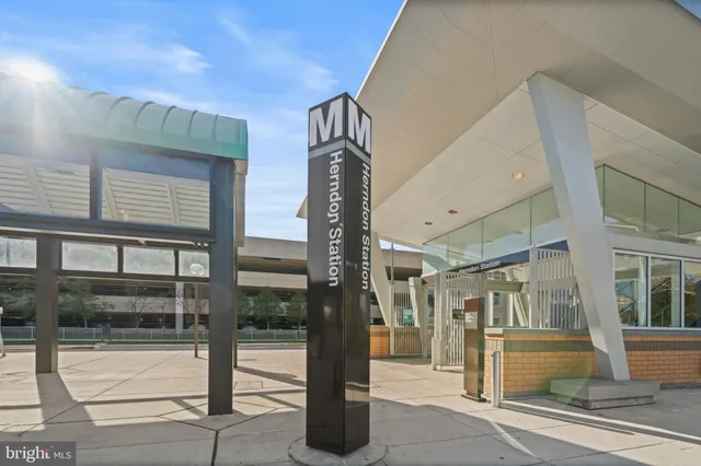 a front view of a building with street view