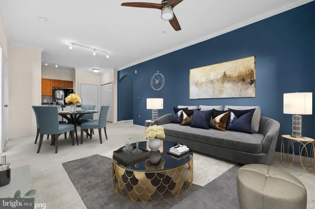 a living room with furniture and a rug