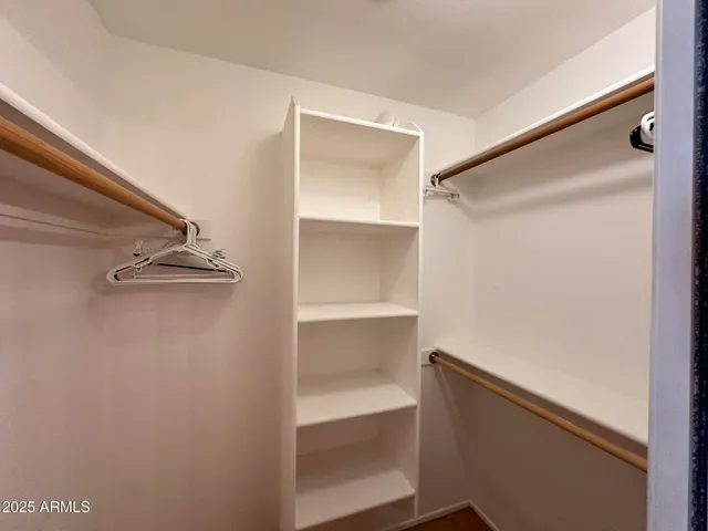a view of an empty walk in closet