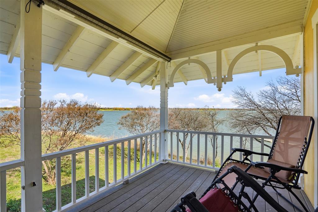 13280 Beach Club Road The Colony, TX 75056 - Photo 34 of 40 a view of a chairs and table in the balcony