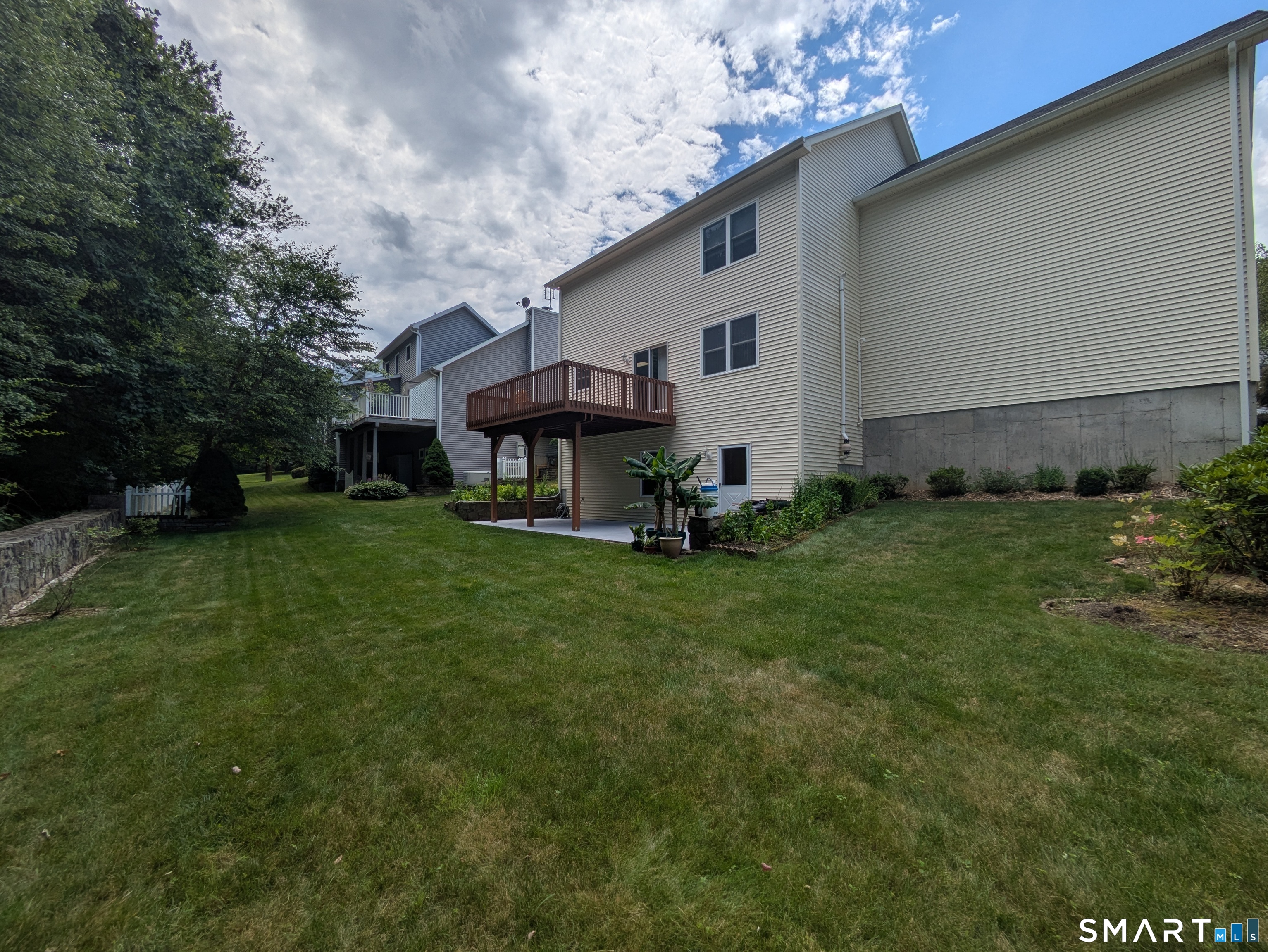 61 Basking Brook Road Shelton, CT 06484 - Photo 25 of 25 a view of a house with a backyard