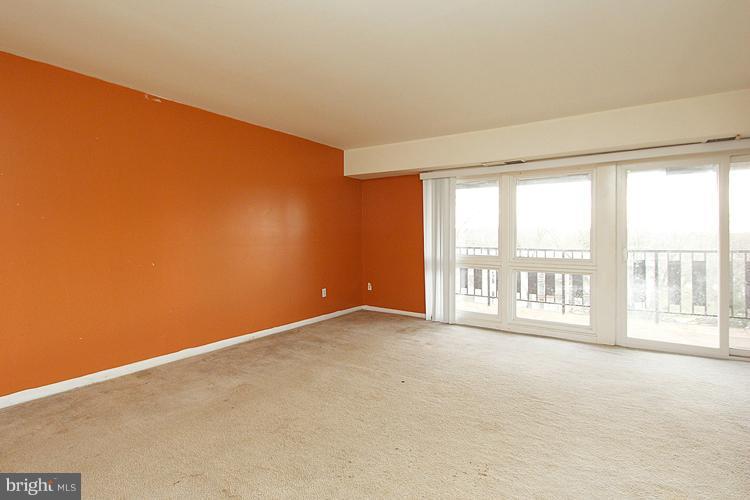 3122 Brinkley Road, Unit 303 Temple Hills, MD 20748 - Photo 2 of 30 a view of an empty room with a window