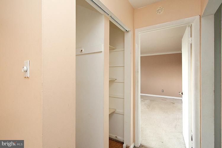 3122 Brinkley Road, Unit 303 Temple Hills, MD 20748 - Photo 11 of 30 a bathroom with a glass shower door