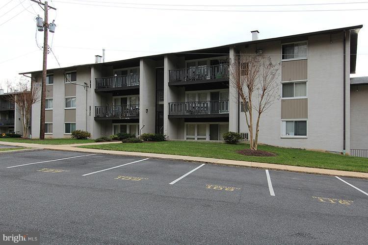 3122 Brinkley Road, Unit 303 Temple Hills, MD 20748 - Photo 15 of 30 a brick building with a outdoor space