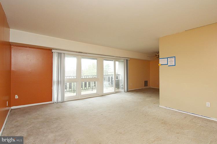 3122 Brinkley Road, Unit 303 Temple Hills, MD 20748 - Photo 23 of 30 a view of an empty room with a window
