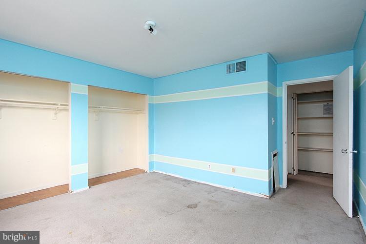 3122 Brinkley Road, Unit 303 Temple Hills, MD 20748 - Photo 27 of 30 a view of an empty room