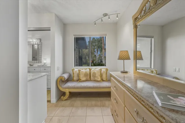 a bathroom with double sink and a mirror