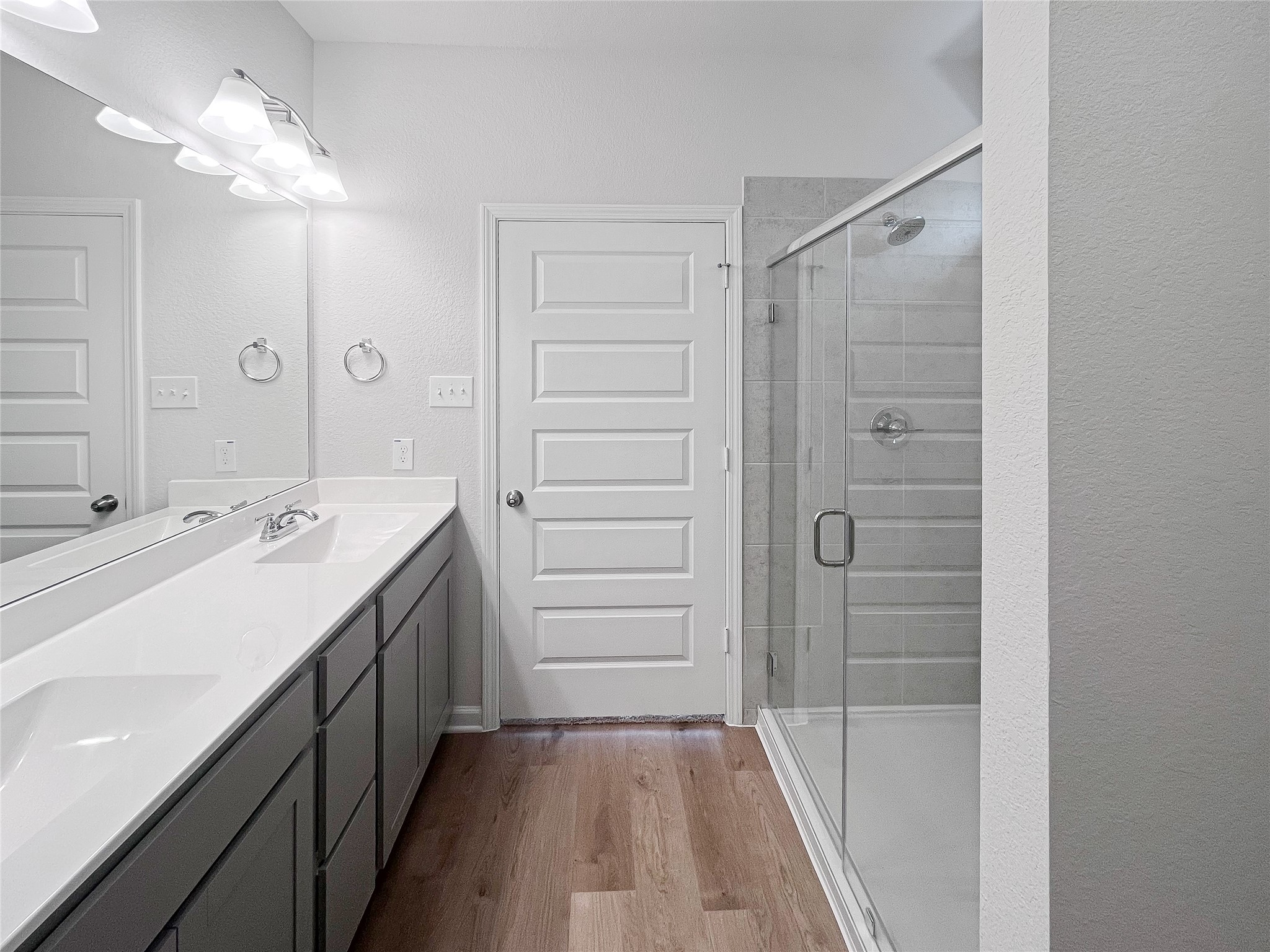 1982 North Riverside Circle Dayton, TX 77535 - Photo 7 of 21 The Caldwell- Primary Bathroom with Large Shower and Dual Vanities. Sample image for illustration; upgrades, options, and colors may vary.