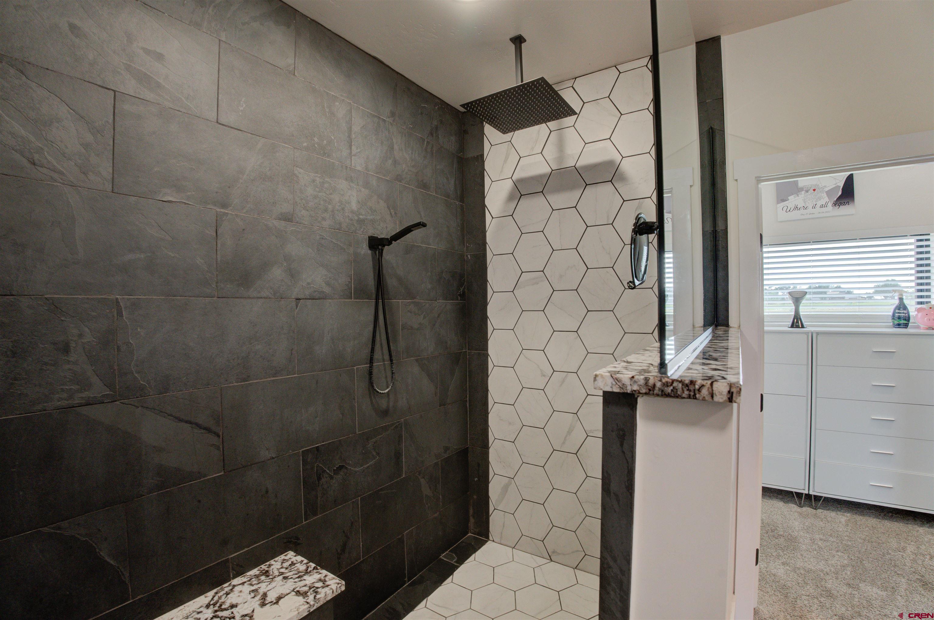 25320 Rd N.8 Loop Cortez, CO 81321 - Photo 18 of 40 a bathroom with a shower