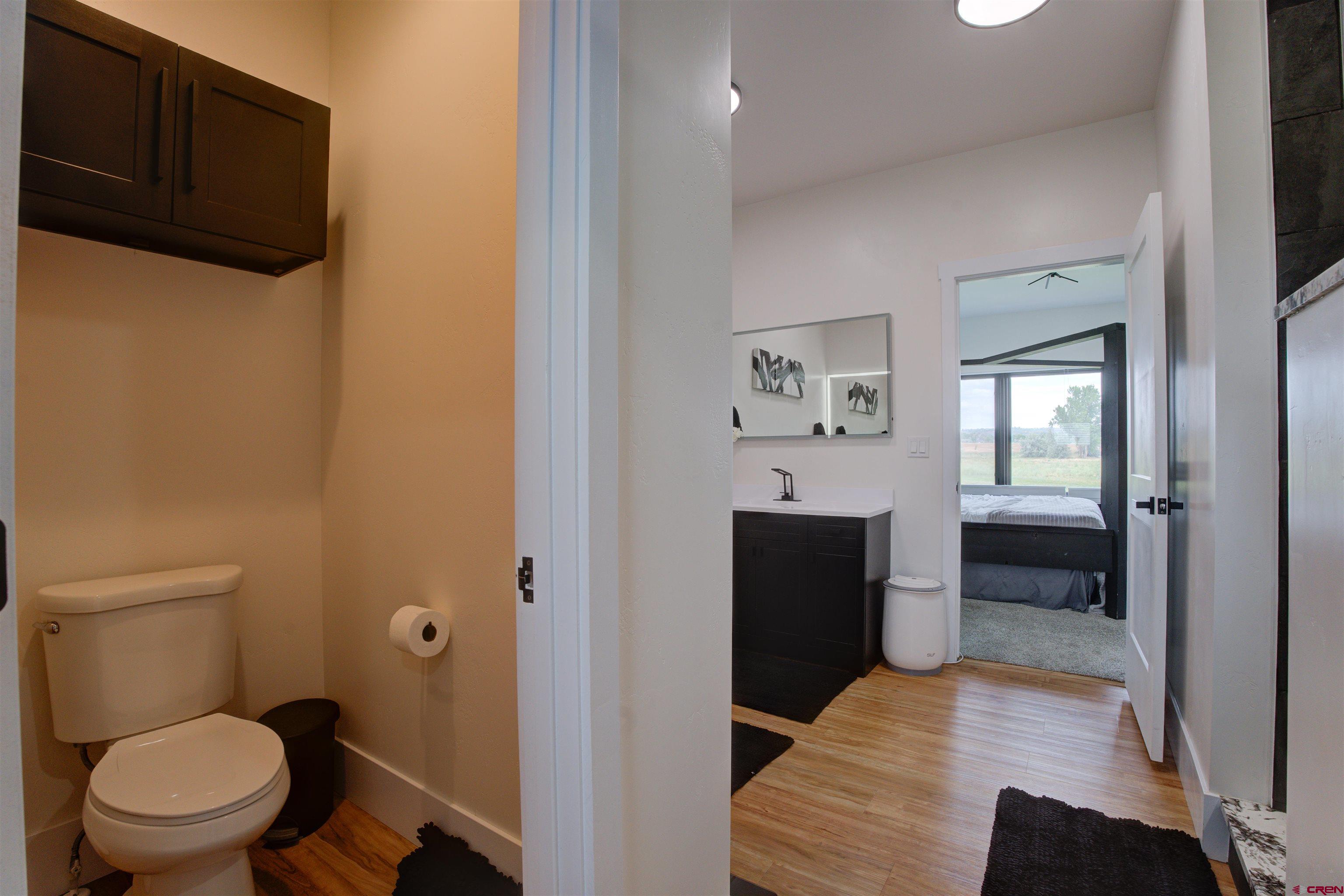 25320 Rd N.8 Loop Cortez, CO 81321 - Photo 19 of 40 a bathroom with a toilet and a shower