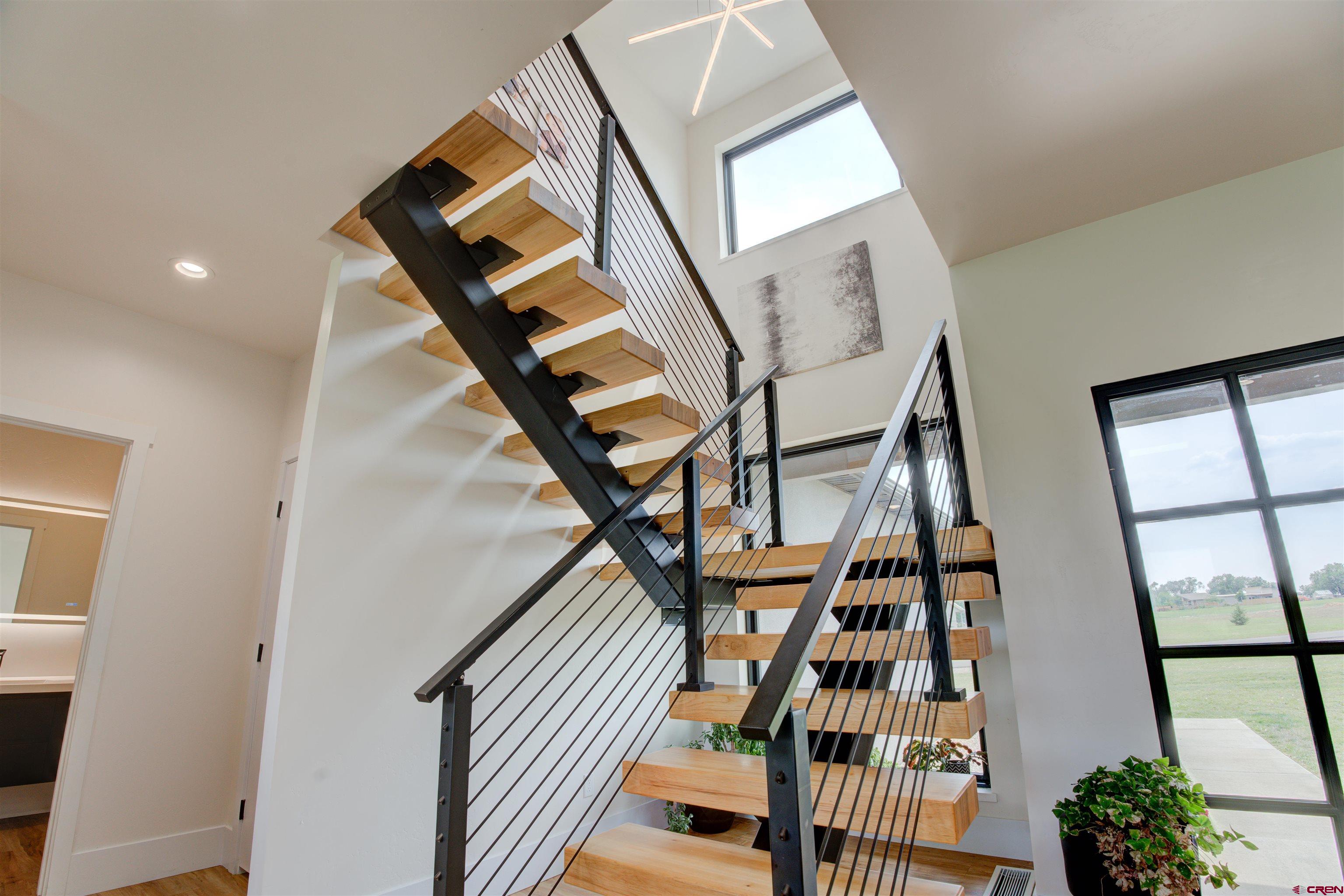 25320 Rd N.8 Loop Cortez, CO 81321 - Photo 24 of 40 a view of staircase with white walls and a window