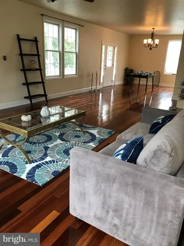 a view of a living room and dining room
