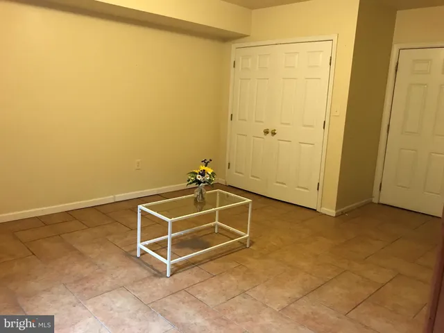 a room with a table and painted walls