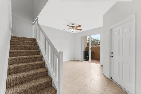 a view of entryway and hall with a window