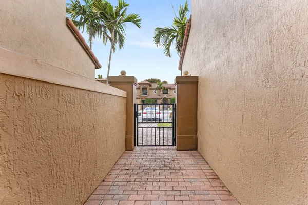 a view of a brick house with a large door