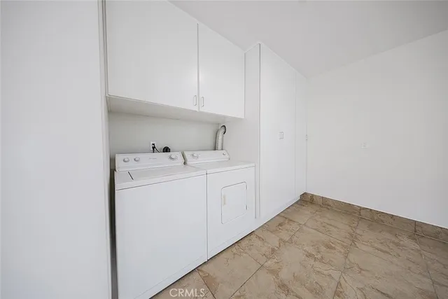 a view of empty room with windows