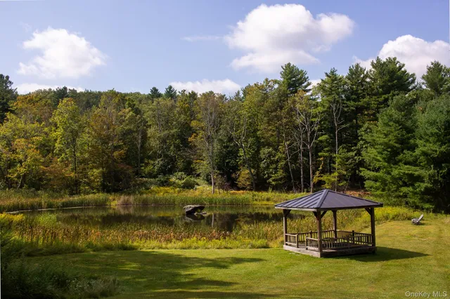 a view of a lake with a yard