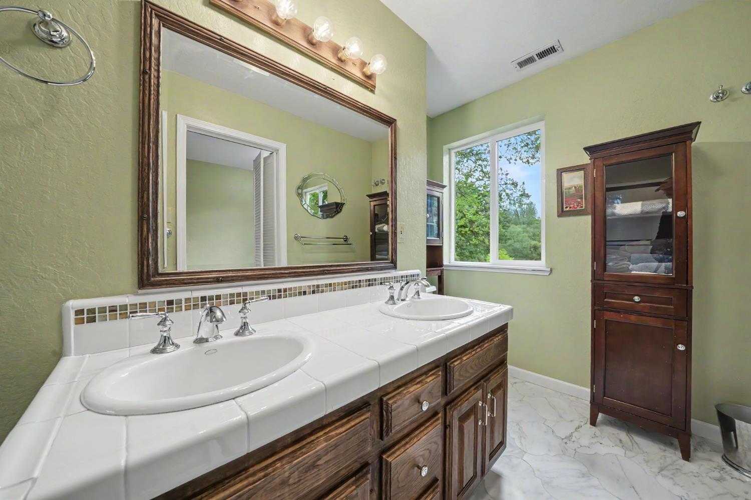 19351 Fiddletown Road Fiddletown, CA 95629 - Photo 33 of 51 Third full bathroom upstairs with stunning marble floor