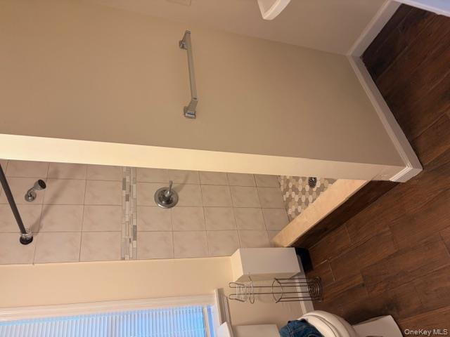42 Hasbrouck Street Newburgh, NY 12550 - Photo 5 of 24 Full bathroom featuring dark wood finished floors and a stall shower