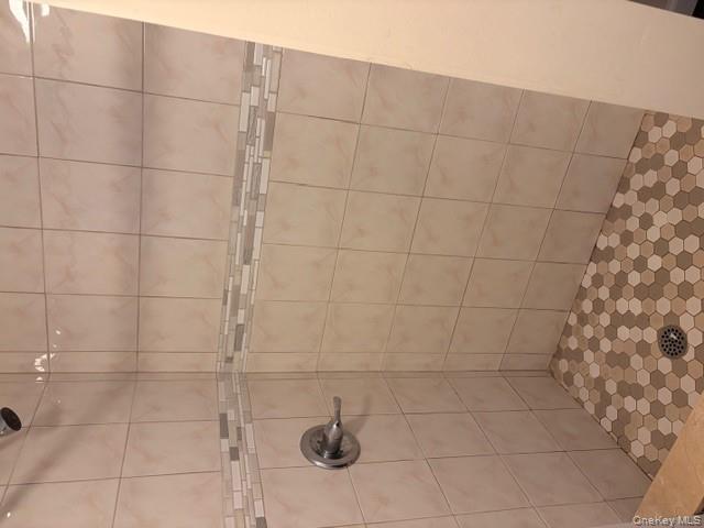 42 Hasbrouck Street Newburgh, NY 12550 - Photo 6 of 24 Full bathroom featuring a shower stall