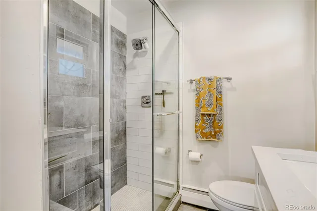 a bedroom with a bed and a table