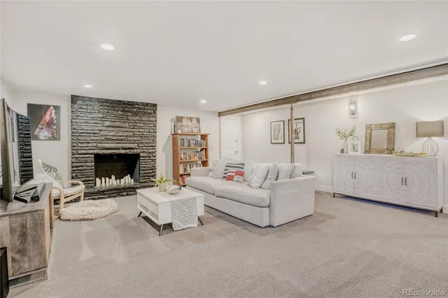 a living room with furniture and a table