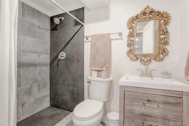 a view of a livingroom with an empty space and a window