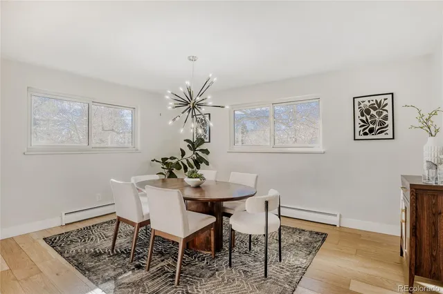 a bedroom with a bed and ceiling fan