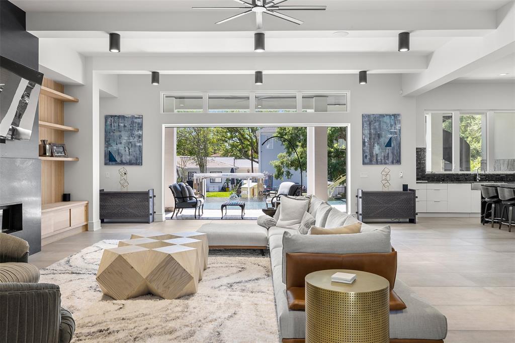 4924 West San Rafael Street Tampa, FL 33629 - Photo 14 of 64 a living room with furniture and a large window