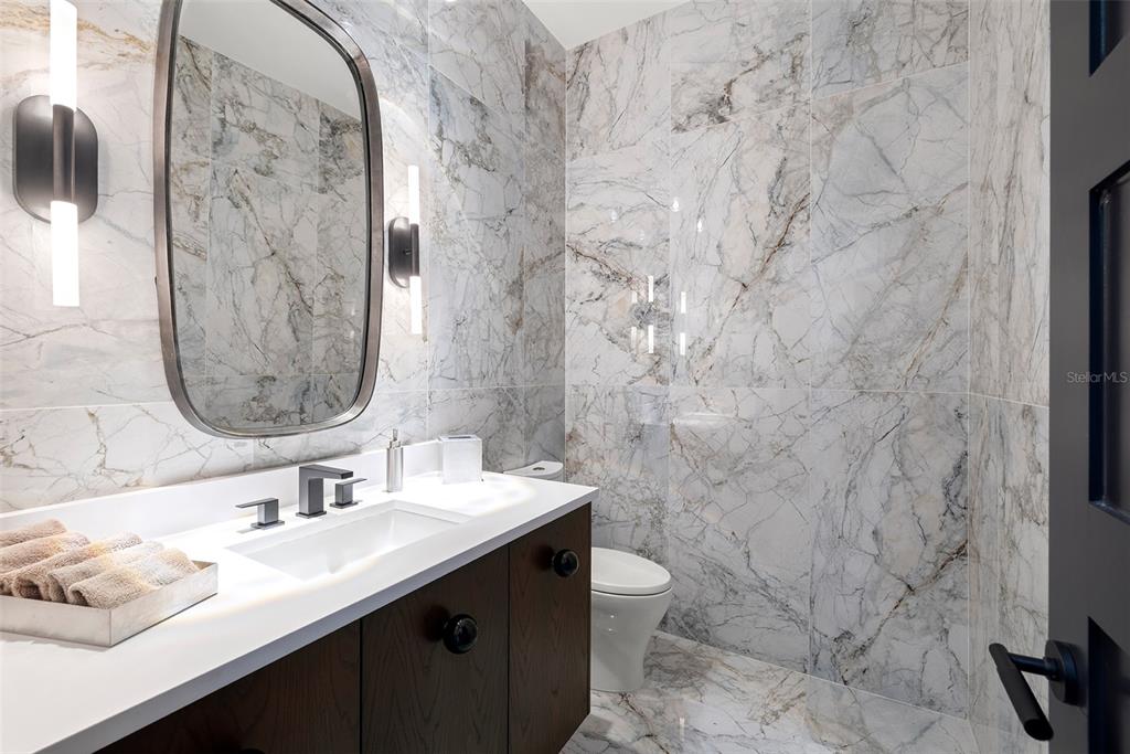 4924 West San Rafael Street Tampa, FL 33629 - Photo 33 of 64 a bathroom with a sink and a mirror