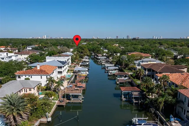 a bathroom with a sink vanity granite and a mirror