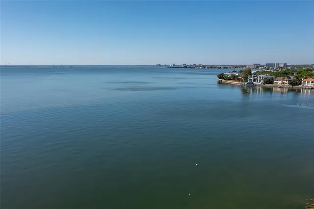 a spacious bathroom with a sink double vanity and a shower