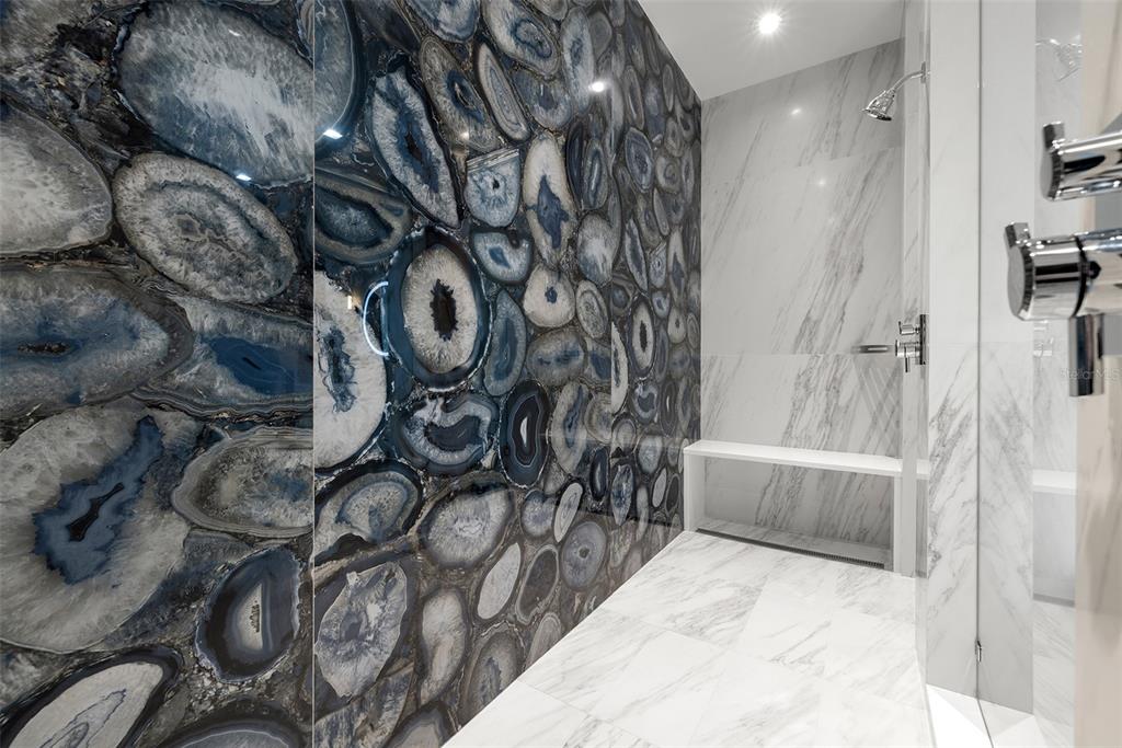 4924 West San Rafael Street Tampa, FL 33629 - Photo 51 of 64 a bathroom with a bathtub and shower