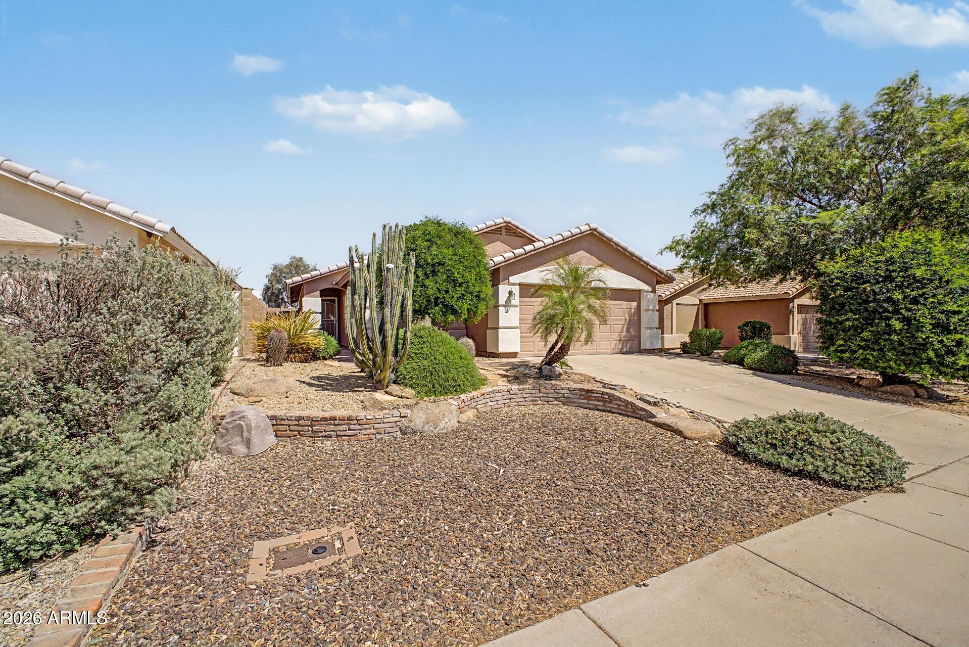 3691 South Conestoga Road Apache Junction, AZ 85119 - Photo 2 of 31 a view of a house with a street