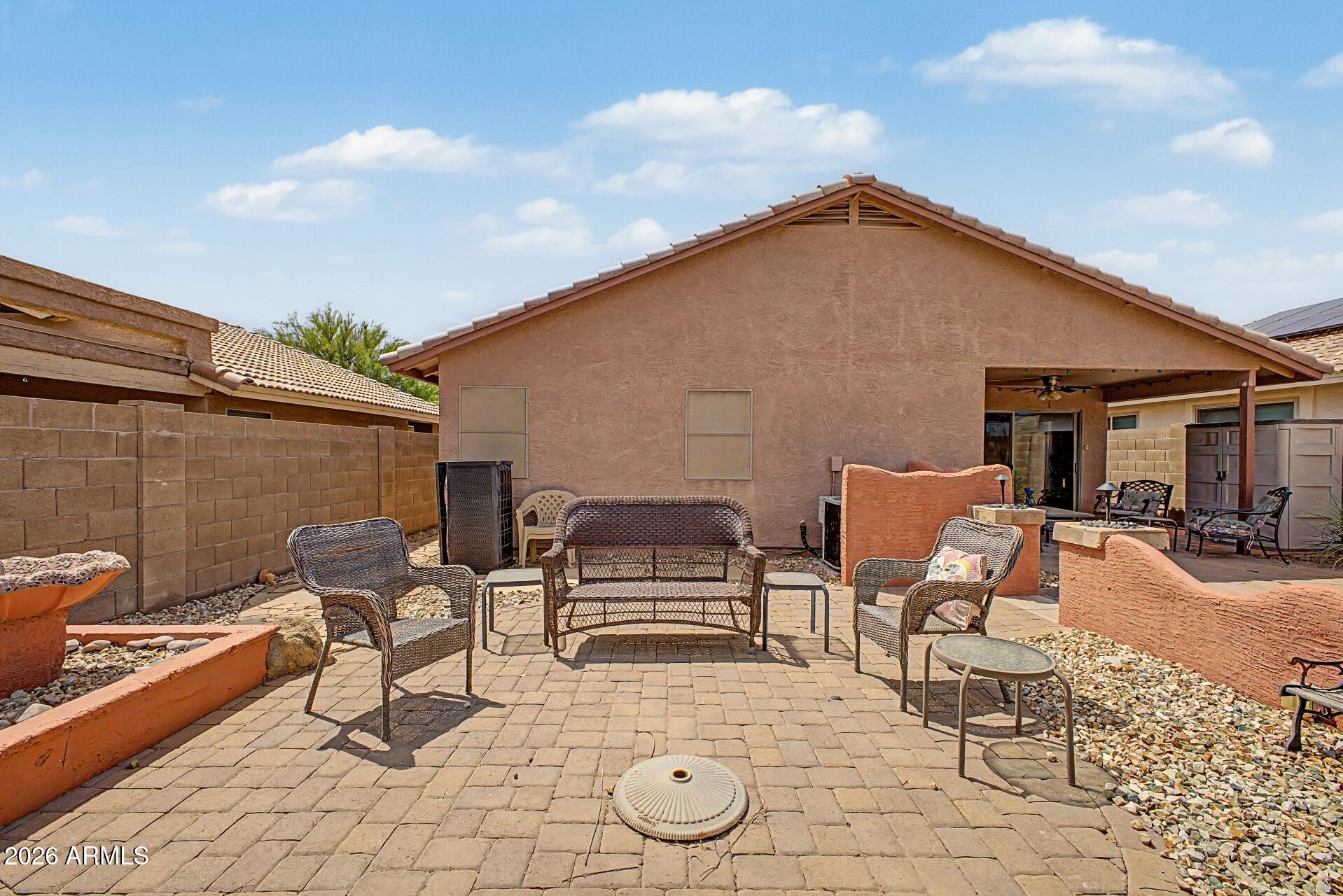 3691 South Conestoga Road Apache Junction, AZ 85119 - Photo 29 of 31 a patio with table and chairs