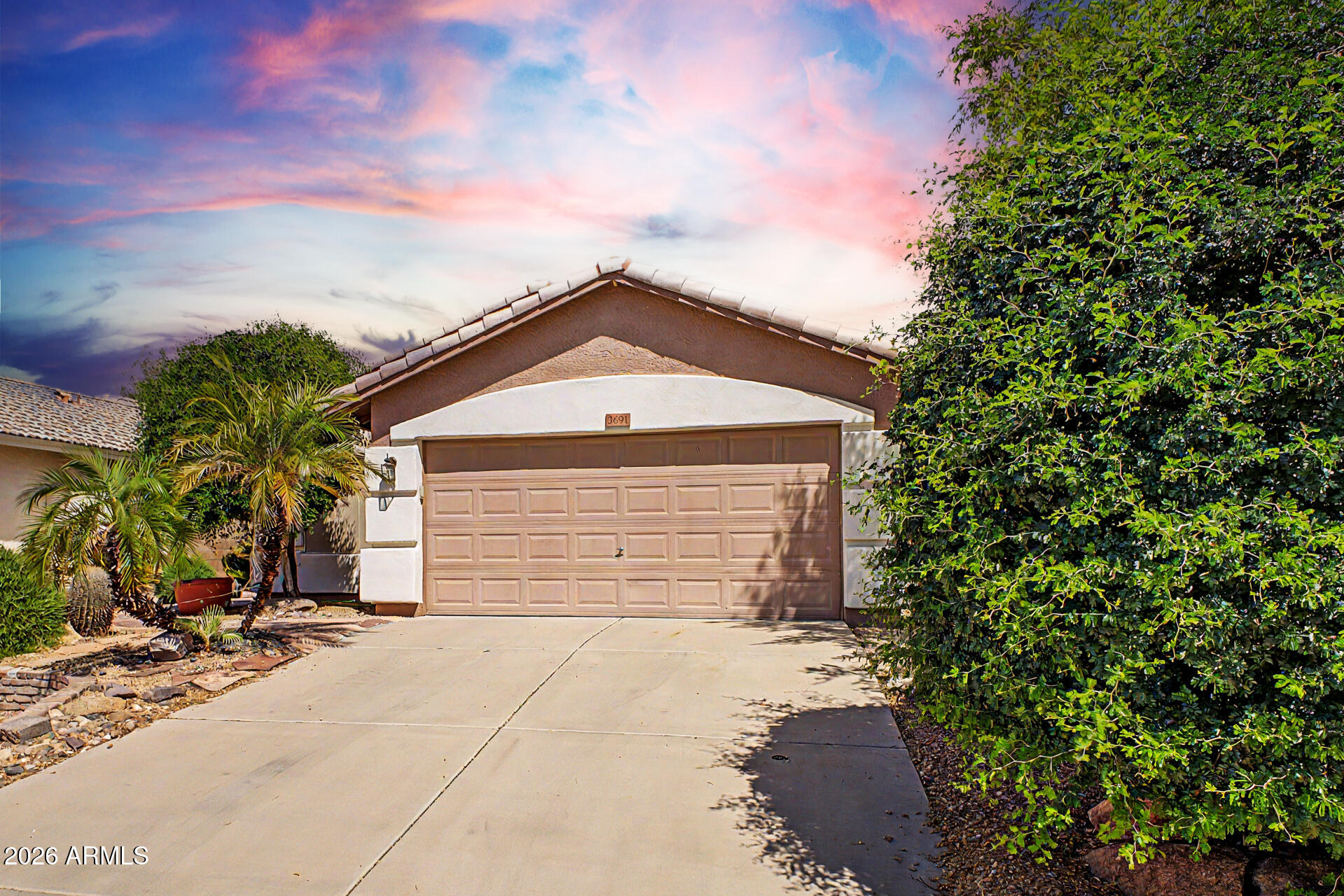 3691 South Conestoga Road Apache Junction, AZ 85119 - Photo 6 of 31 a front view of a house with a yard