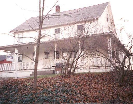 107 Huntingtown Road Newtown, CT 06470 - Photo 1 of 1 a view of a house with a yard