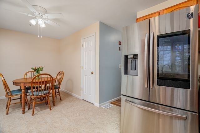 1 B Patriots Way, Unit B Sterling, MA 01564 - Photo 11 of 32 a view of a dining room with furniture