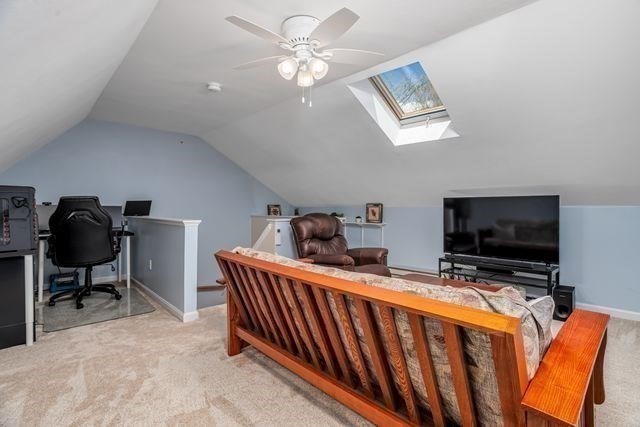 1 B Patriots Way, Unit B Sterling, MA 01564 - Photo 24 of 32 a bedroom with furniture and a flat screen tv