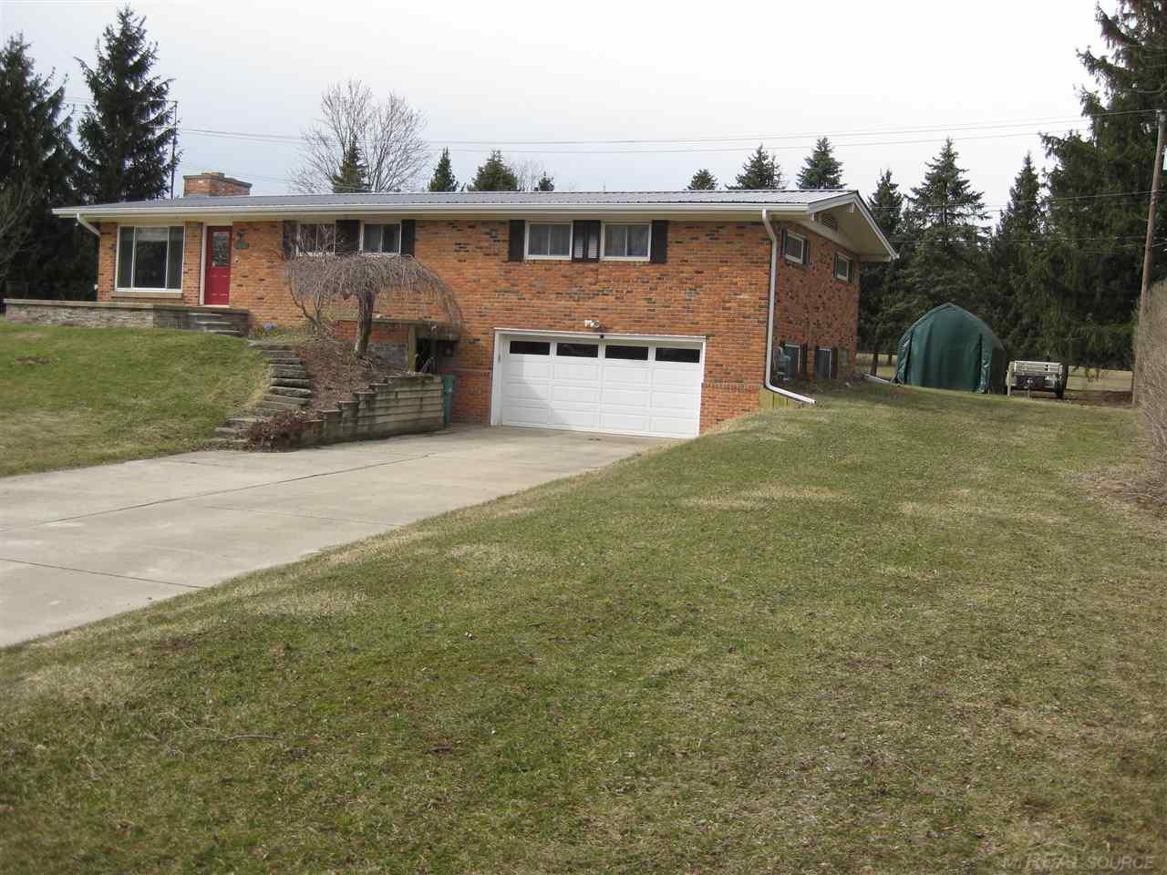 1231 East Gunn Road Rochester, MI 48306 - Photo 1 of 56