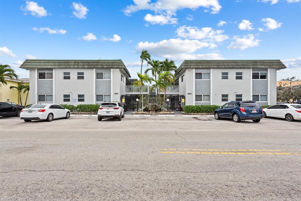 1000 Southeast 15th Street, Unit 103 Fort Lauderdale, FL 33316 - Photo 15 of 15 a group of cars parked in front of a building