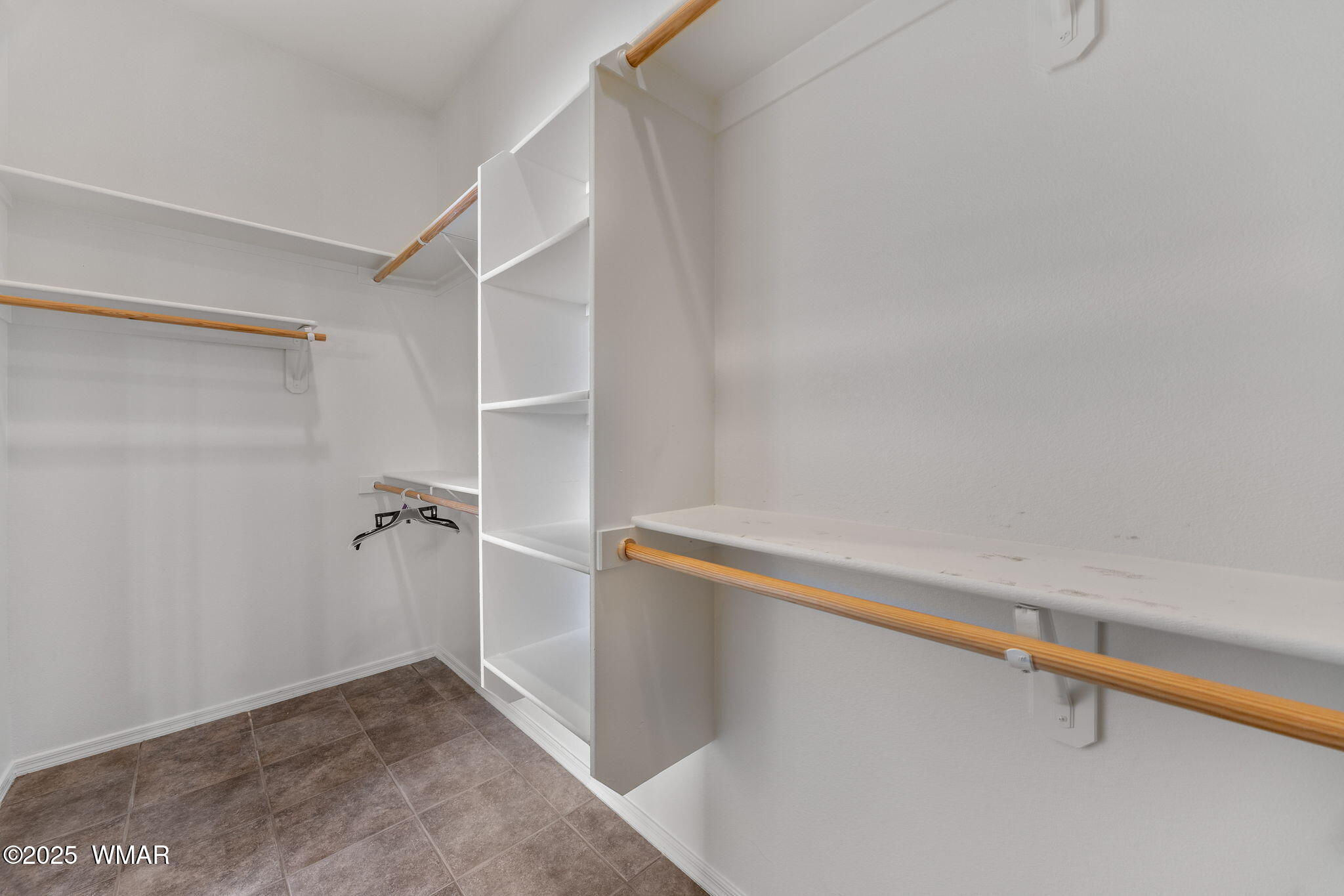 1058 East Adams Street Snowflake, AZ 85937 - Photo 16 of 37 a view of room with walk in closet