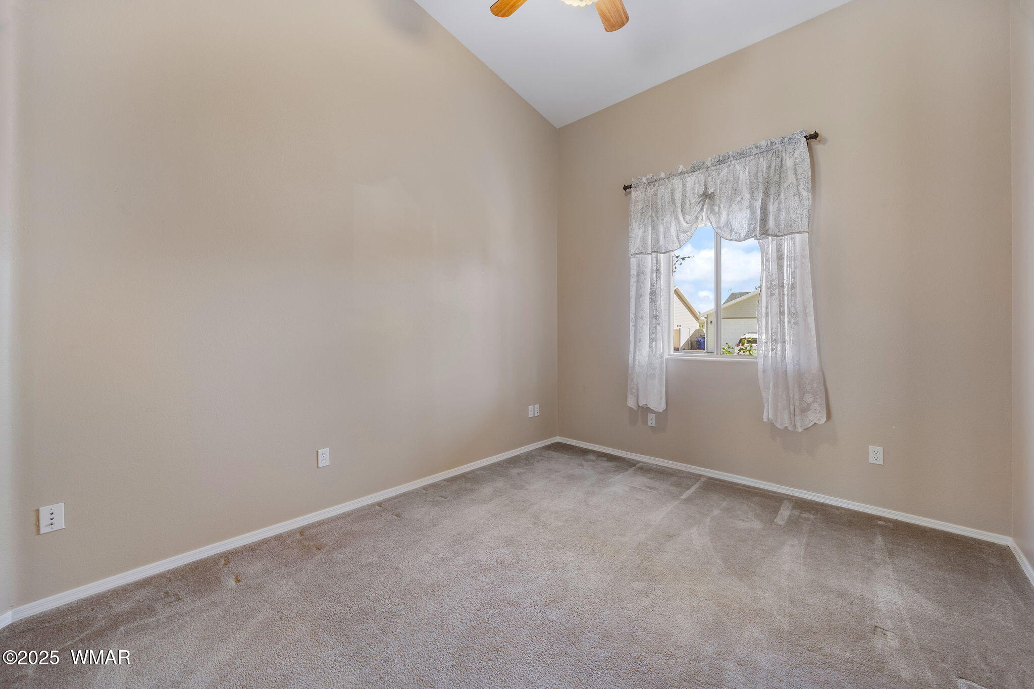 1058 East Adams Street Snowflake, AZ 85937 - Photo 17 of 37 an empty room with windows and natural light
