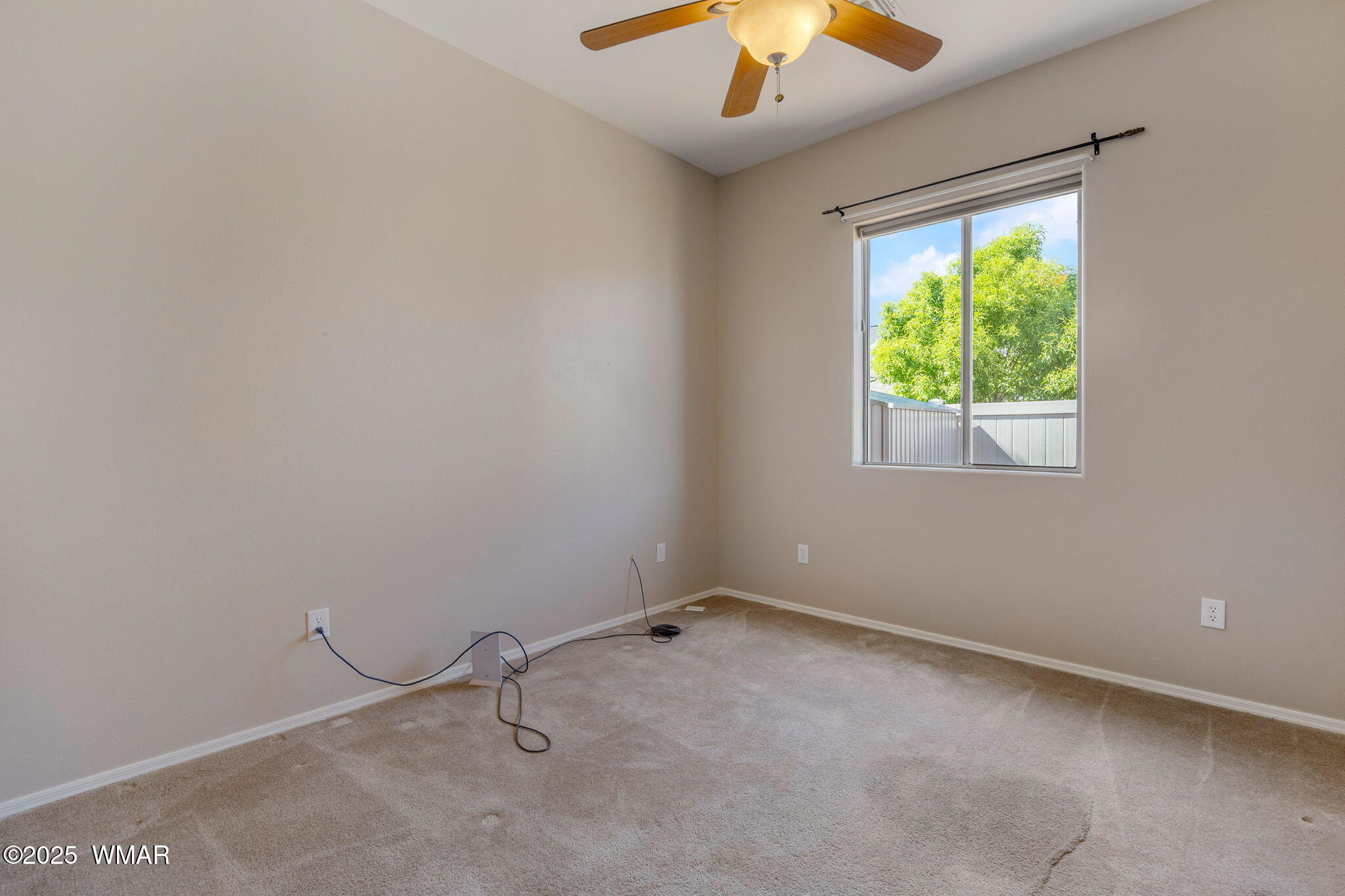 1058 East Adams Street Snowflake, AZ 85937 - Photo 28 of 37 an empty room with a window