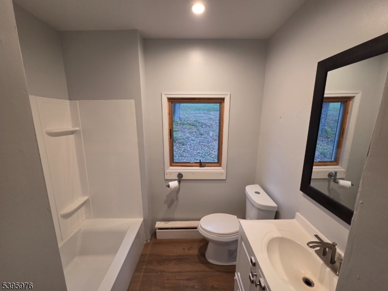 97 Fairmount Road East Califon, NJ 07830 - Photo 21 of 32 a bathroom with a sink toilet and shower