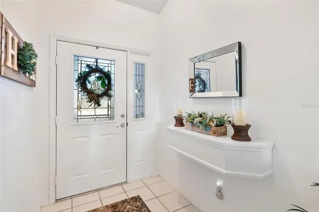 a bathroom with a sink and a window
