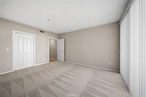 a view of an empty room and window