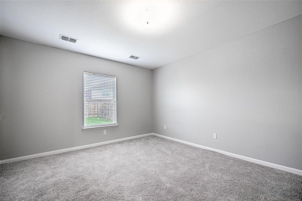 129 Lamont Road Anna, TX 75409 - Photo 29 of 40 an empty room with a window